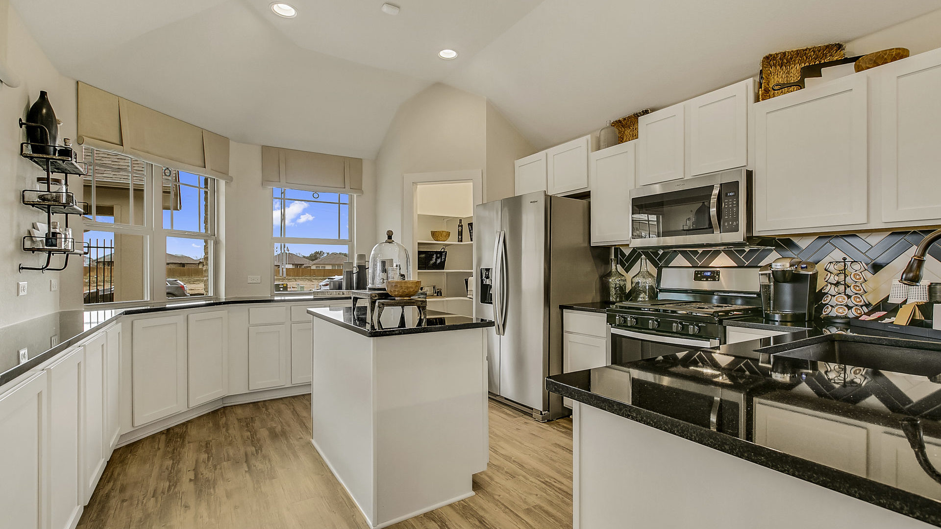 Pecan Park Model Home Kitchen With Wrap Around Counter And Island