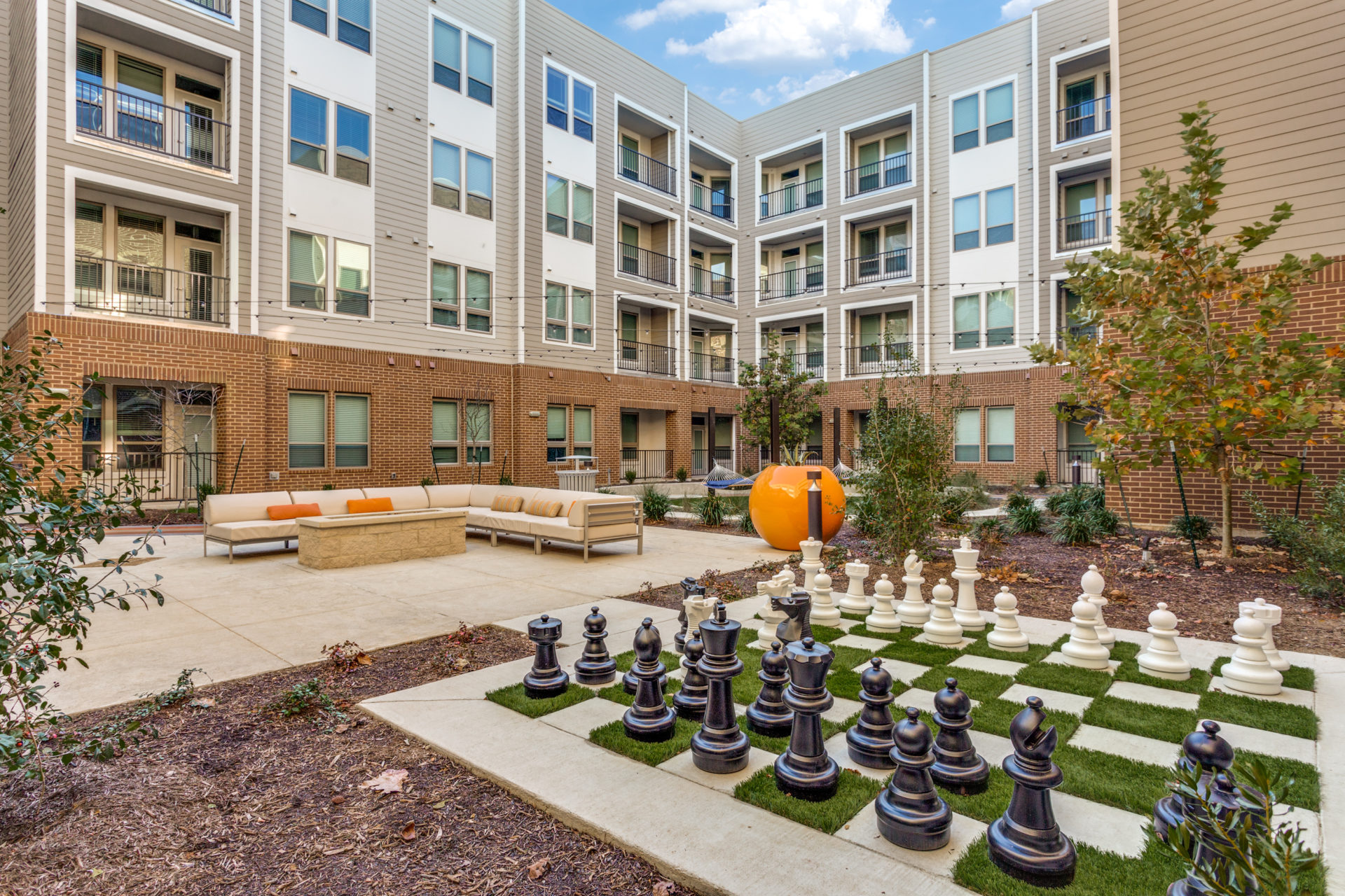 Live & Earn Quest Apartments Courtyard
